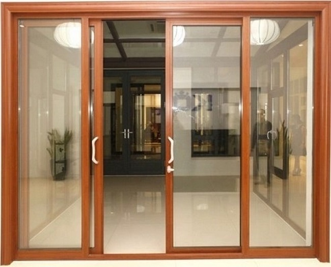 Mẫu cửa lùa đẹp 4 cánh khung kính màu vân gỗ
